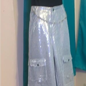 Silver Sequined Pants for a Night on the Town paired with Sleeveless Halter Top